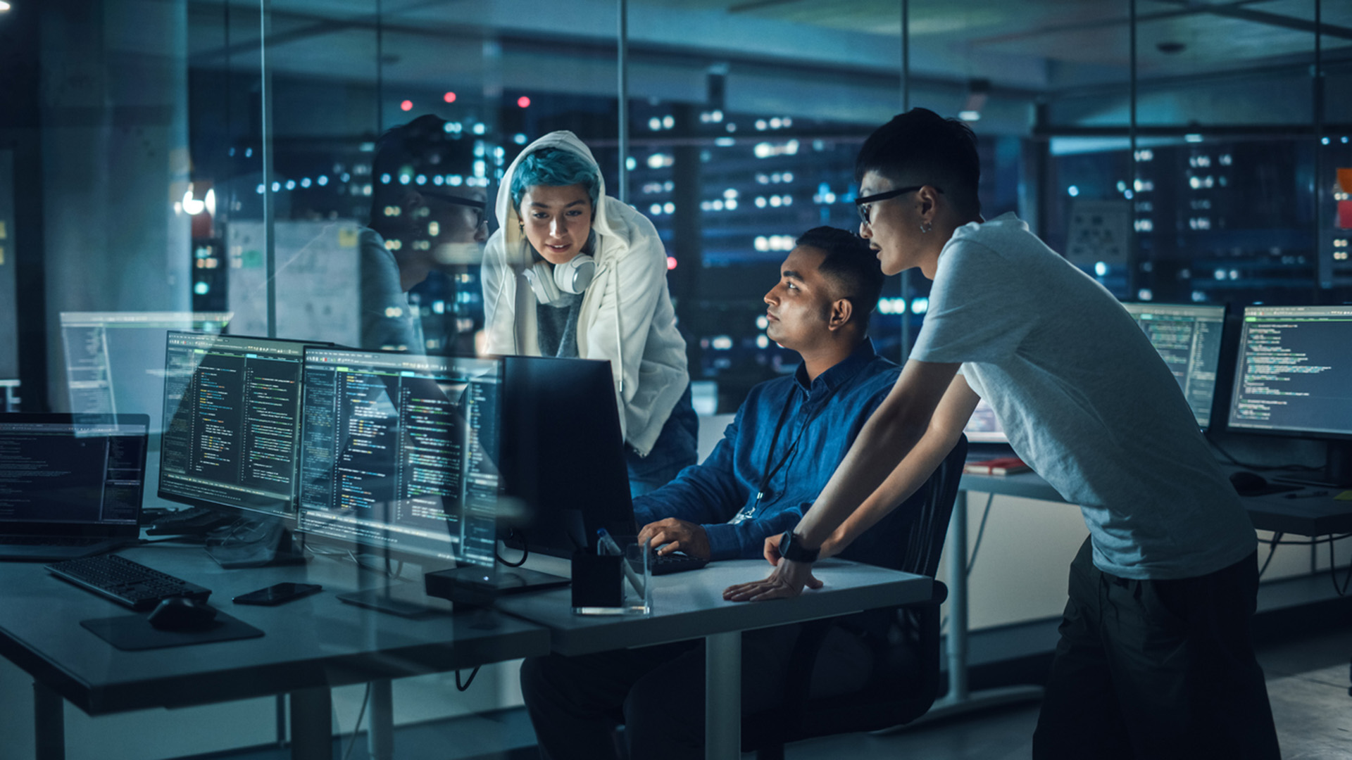 Cybersecurity specialists monitoring mission-critical systems